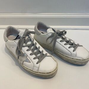 Golden Goose Womens High Star Sneakers with Silver Star and Metallic Hee…